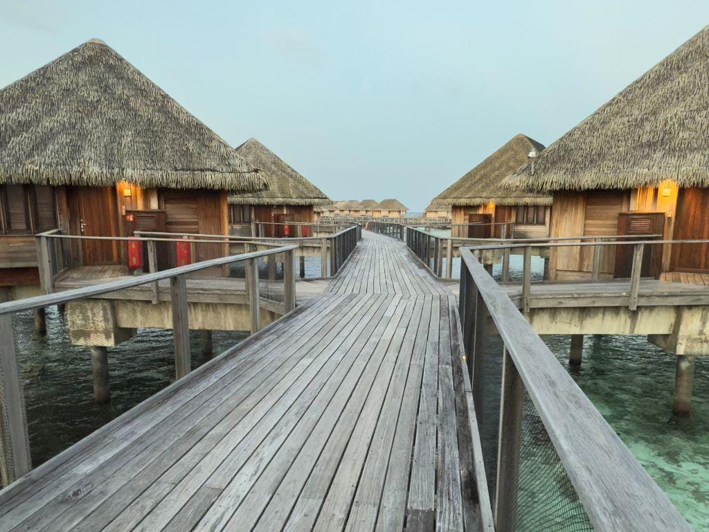 Manta Overwater Suite walkway at Club Med Kani